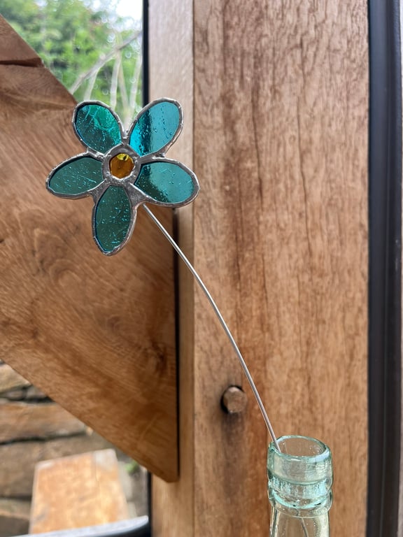 Turquoise blue daisy shape stained glass flower