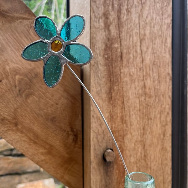 Turquoise blue daisy shape stained glass flower