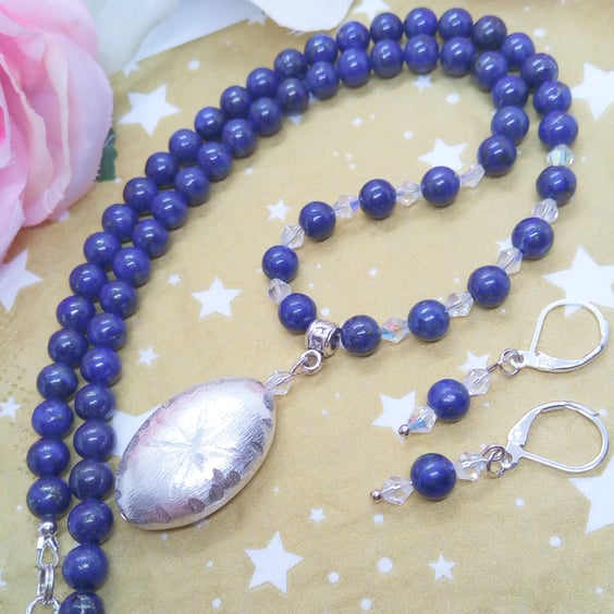 Oval Silver Pendant on a Lapis Lazuli and Clear Crystal Necklace and Earrings