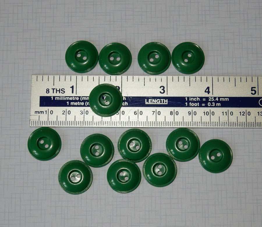 Raised green plastic buttons 18mm