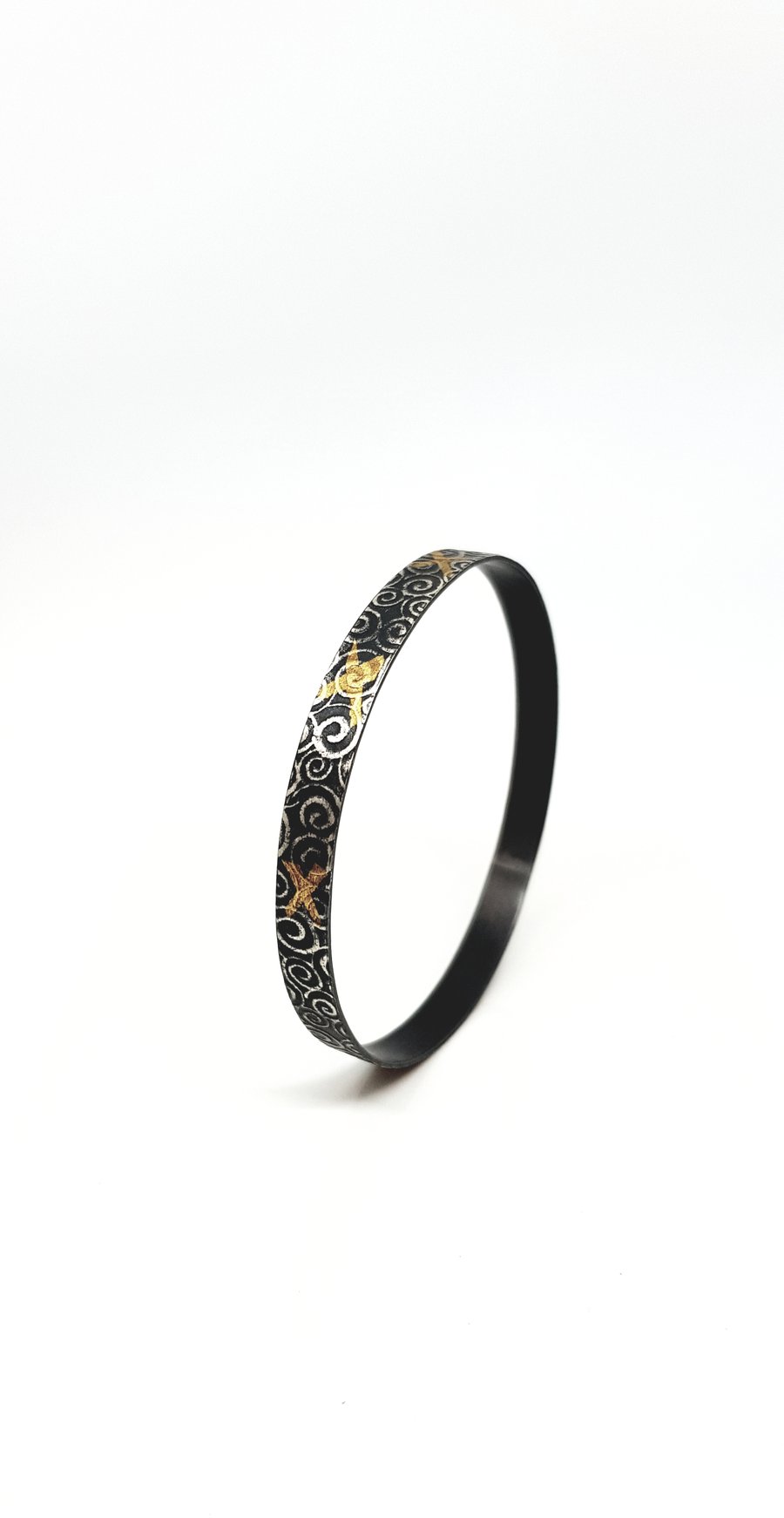 Noa by Fedha - oxidised, embossed sterling silver bangle with Keum Boo detail