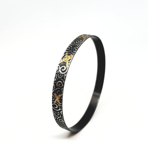 Noa by Fedha - oxidised, embossed sterling silver bangle with Keum Boo detail