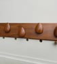 Five sapele pebbles - Image 1