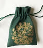 Gold floral drawstring green fabric small  bag hand printed allium flower design - Image 1