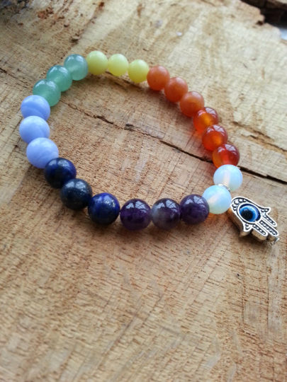 Chakra Hamsa hand all seeing eye charm stretch bracelet. Various stones