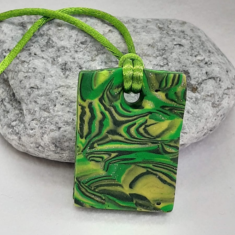Rectangular polymer clay pendant in green