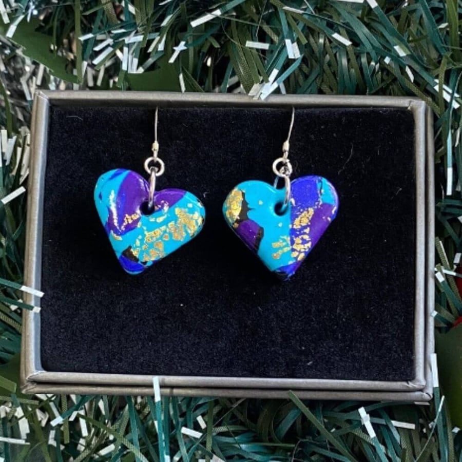Purple and turquoise heart polymer clay earrings on sterling silver ear wires.