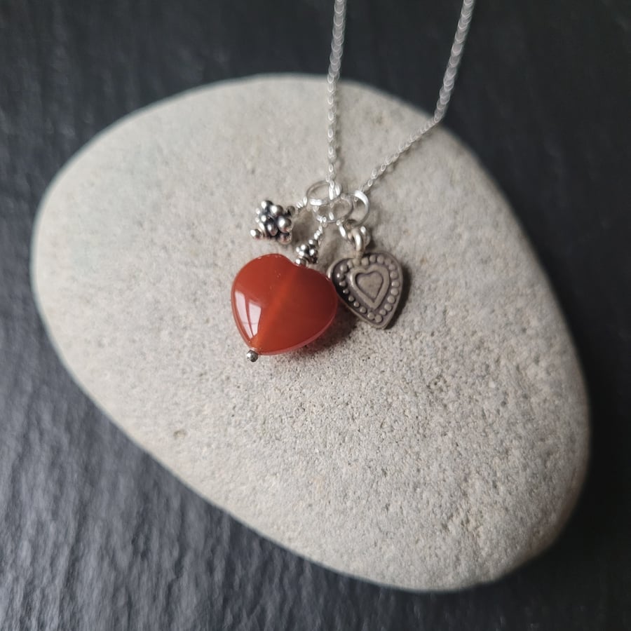 Red agate heart and sterling silver pendant