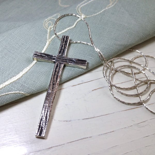 Sterling Silver Textured Cross. 