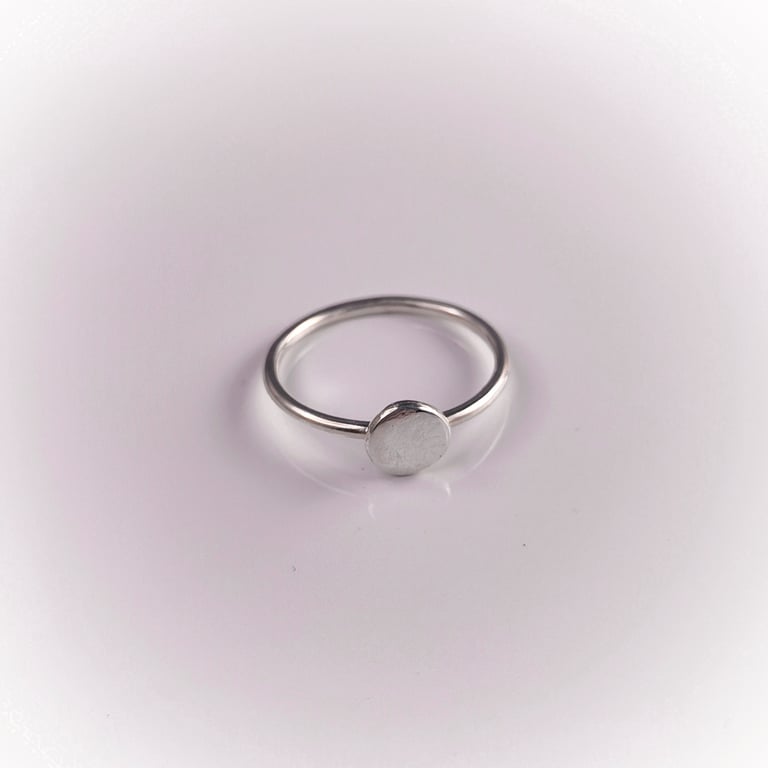 Sterling silver ring with forged disc
