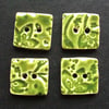Set of four small square green leafy ceramic buttons