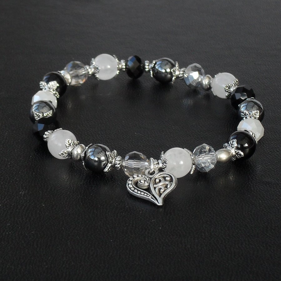 Handmade black and white bracelet with heart charm