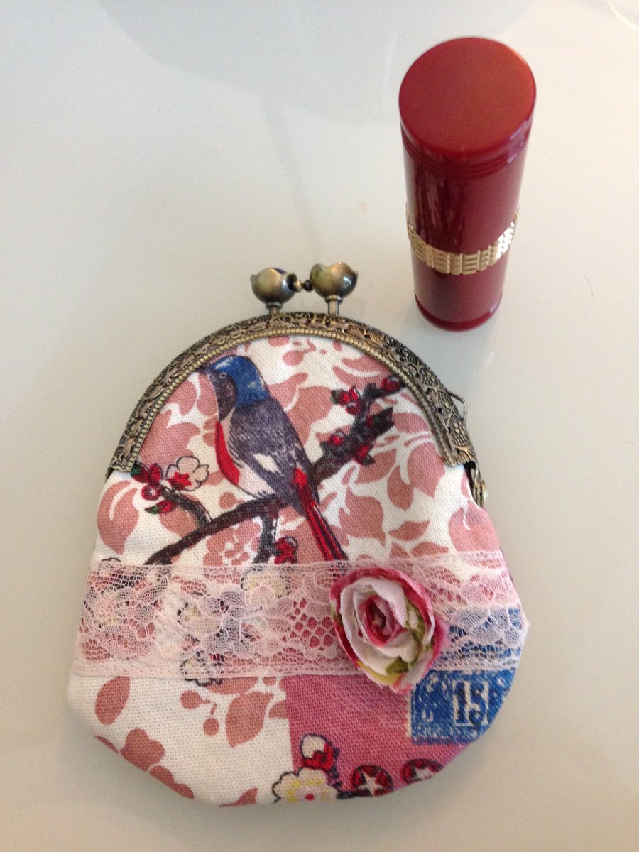 Vintage inspired purse featuring a pretty bird with lace & flower embellishment