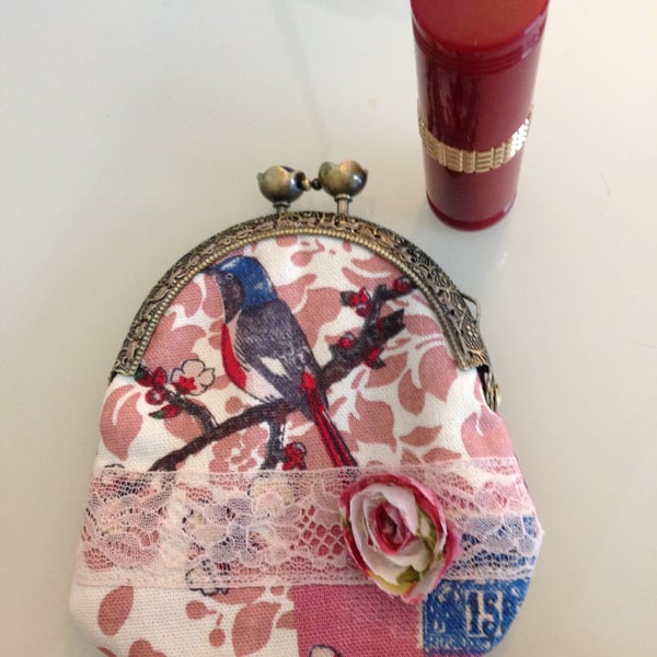 Vintage inspired purse featuring a pretty bird with lace & flower embellishment