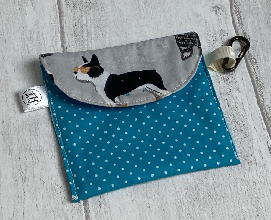Dog treat bag with small carabiner clip. Turquoise spots