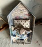 Paper mache sleeping hare under handmade quilt - Image 3