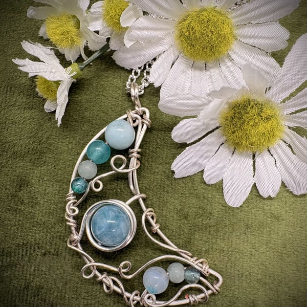 Silver wire wrapped Crescent Moon pendant