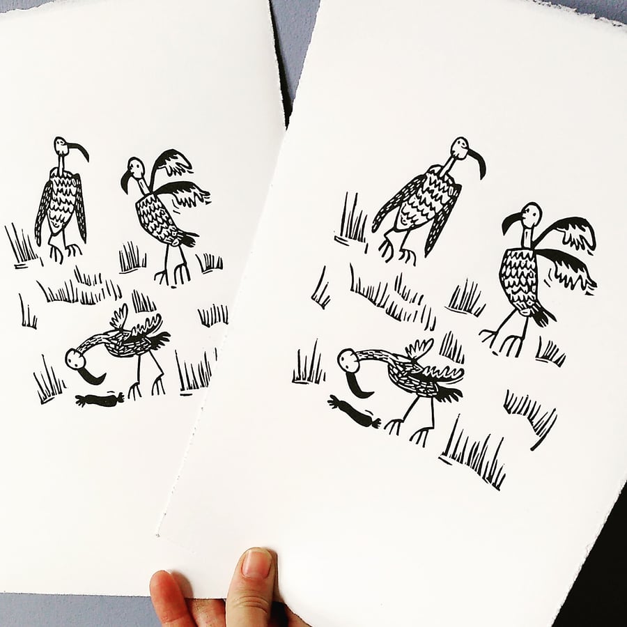 Three Vultures in a Field with a Sausage - lino cut print