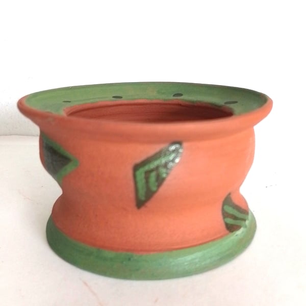 Pottery terracotta red church or pillar candleholder hand painted green motifs