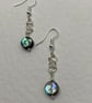 Wirework infinity symbol earrings with circular paua shell charms - Image 4