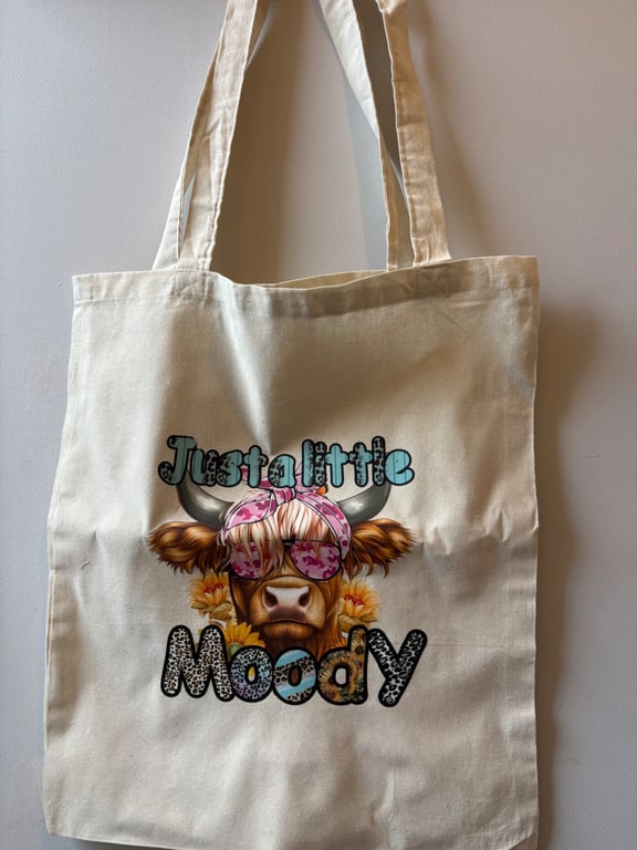 Just a little moody Highland cow tote bag 