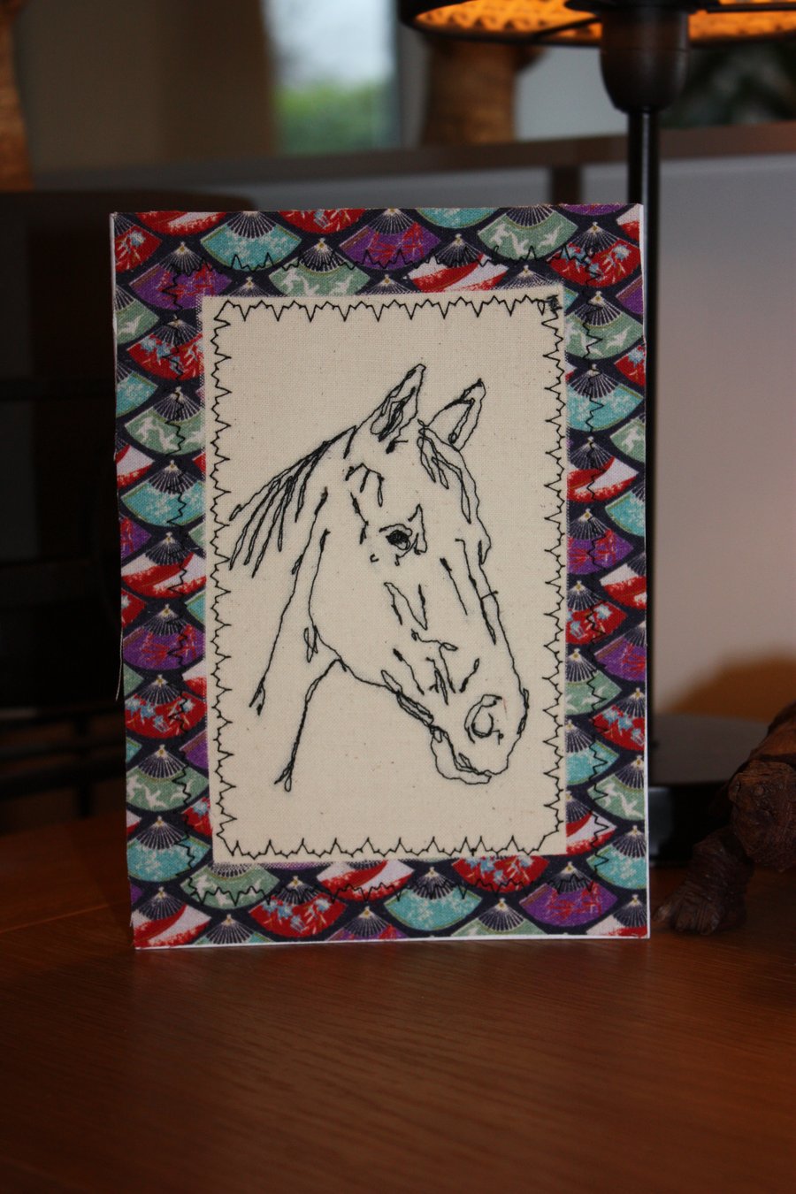 Horse head with a colourful border