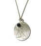 roller printed sterling silver oval pendant with rose cut black spinel