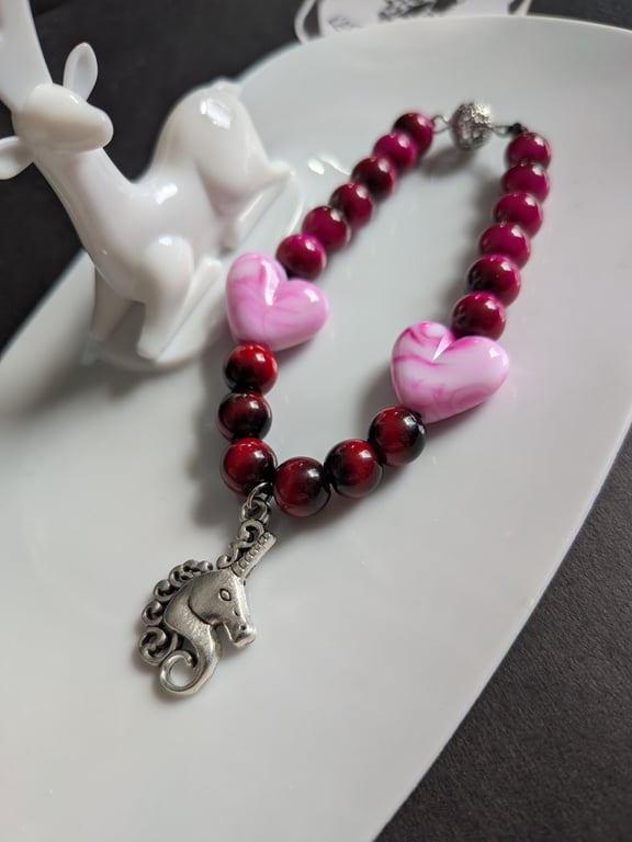 Pink and red heart beaded bracelet with unicorn 