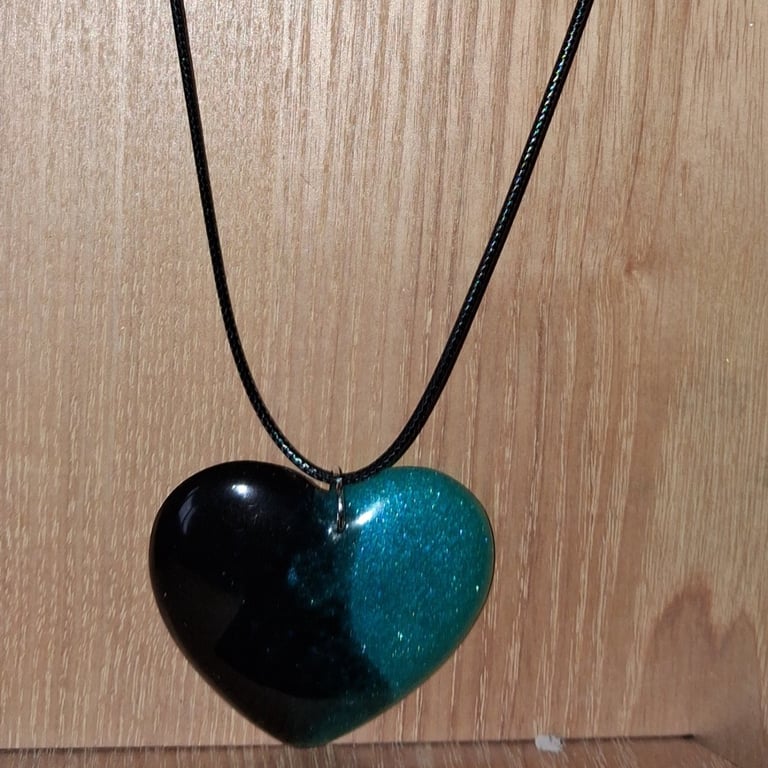 Handmade resin heart pendant on  black waxed cord