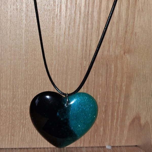 Handmade resin heart pendant on  black waxed cord
