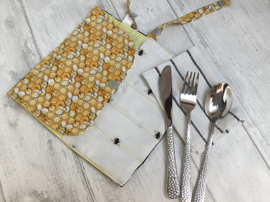 Travel cutlery roll with cutlery. Bees and stars