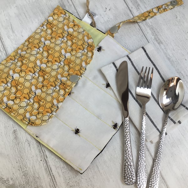 Travel cutlery roll with cutlery. Bees and stars