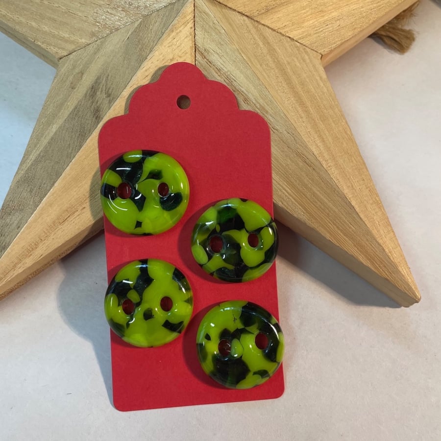 Set of 4 green glass buttons. 