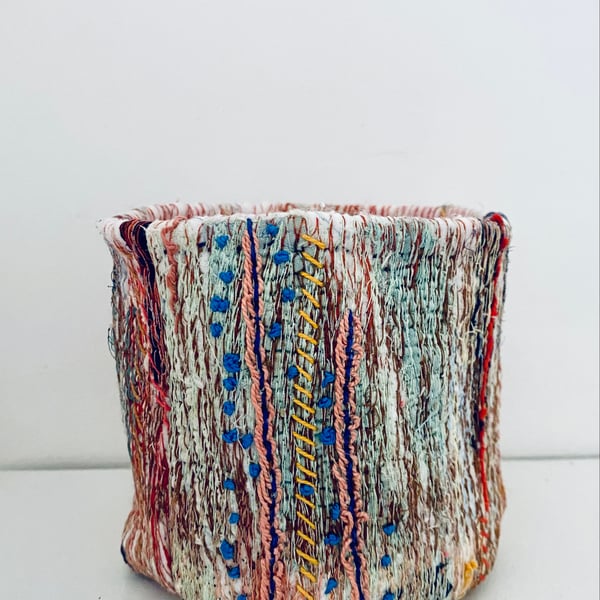 Colourful tactile, textile pot, storage or plant holder 