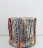 Colourful tactile, textile pot, storage or plant holder 