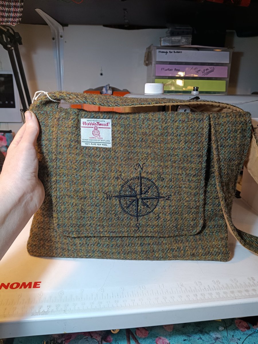 Harris tweed messenger bag with nautical compass