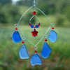 Blue glass suncatcher with star