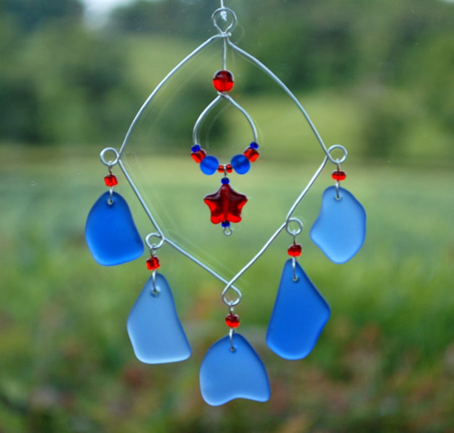 Blue glass suncatcher with star