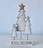 Three Christmas Trees on a Painted Wooden Block Stand