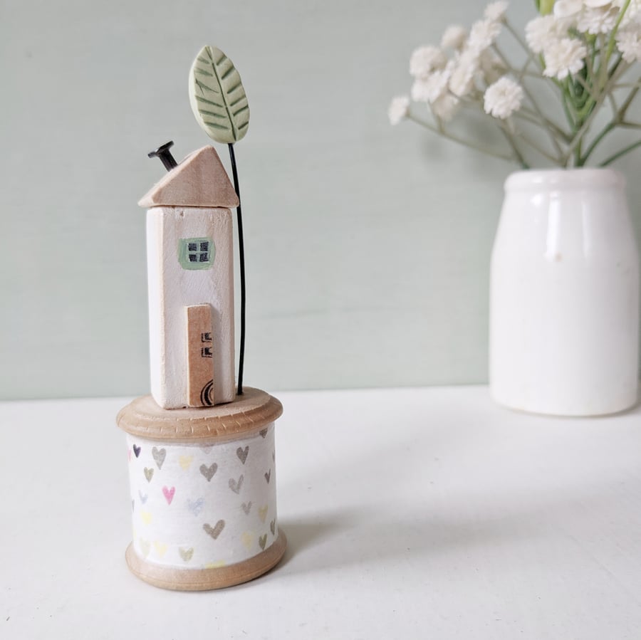 Wooden House on a Vintage Bobbin with Clay Tree 