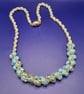 Hand Crafted Beaded Necklace in Turquoise & Gold Colour