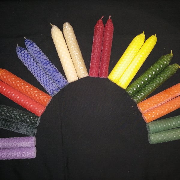 Small dark blue rolled beeswax candle