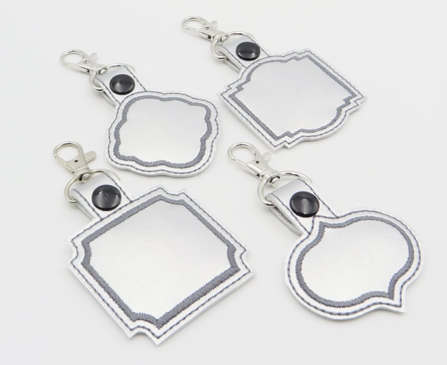 Machine Embroidery Pattern, Set of 4 blank key fobs with fancy retro frames