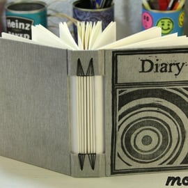 Journal in classic grey, original lino print on the cover