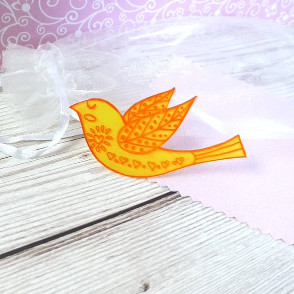 Golden yellow folk art style bird jacket pin. Handmade unisex lapel pin         