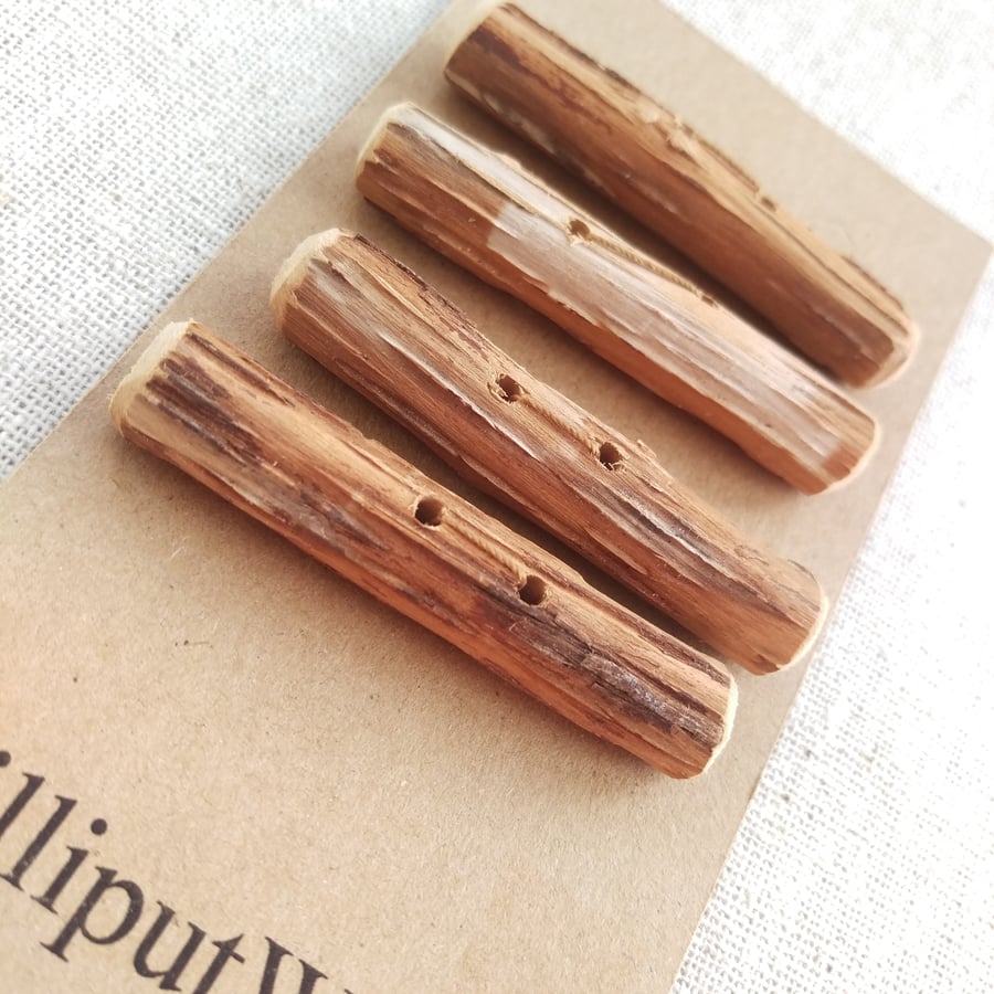 Four driftwood toggle buttons