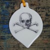 Porcelain skull and crossbones decoration