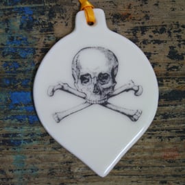 Porcelain skull and crossbones decoration