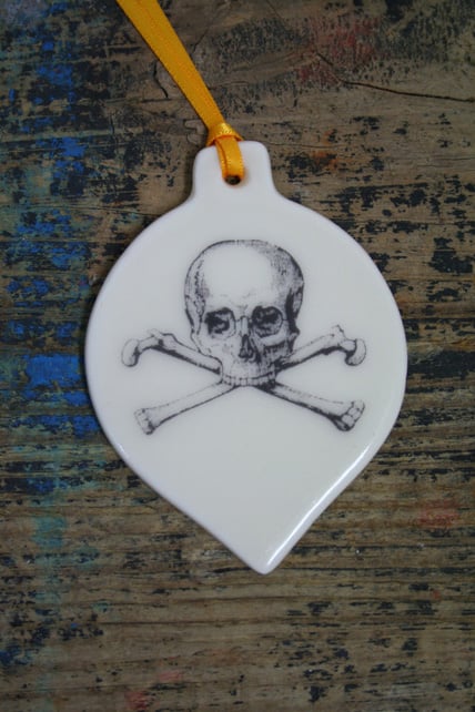 Porcelain skull and crossbones decoration