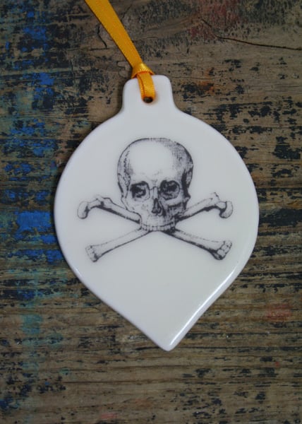 Porcelain skull and crossbones decoration